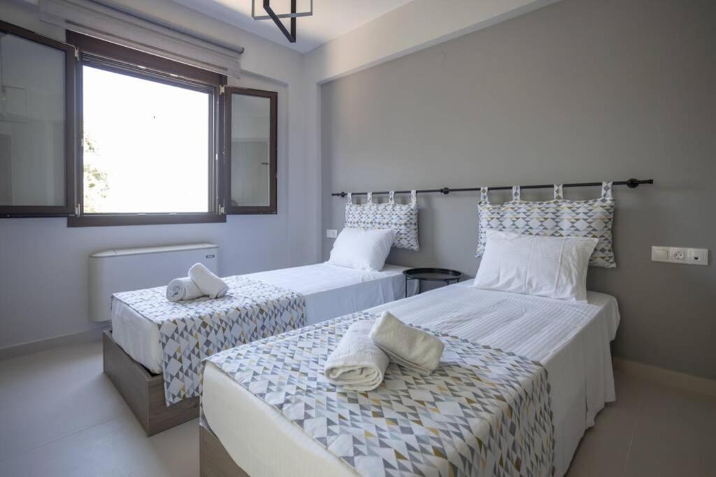 Mela Luxury Apartments Maroulás Exteriör bild